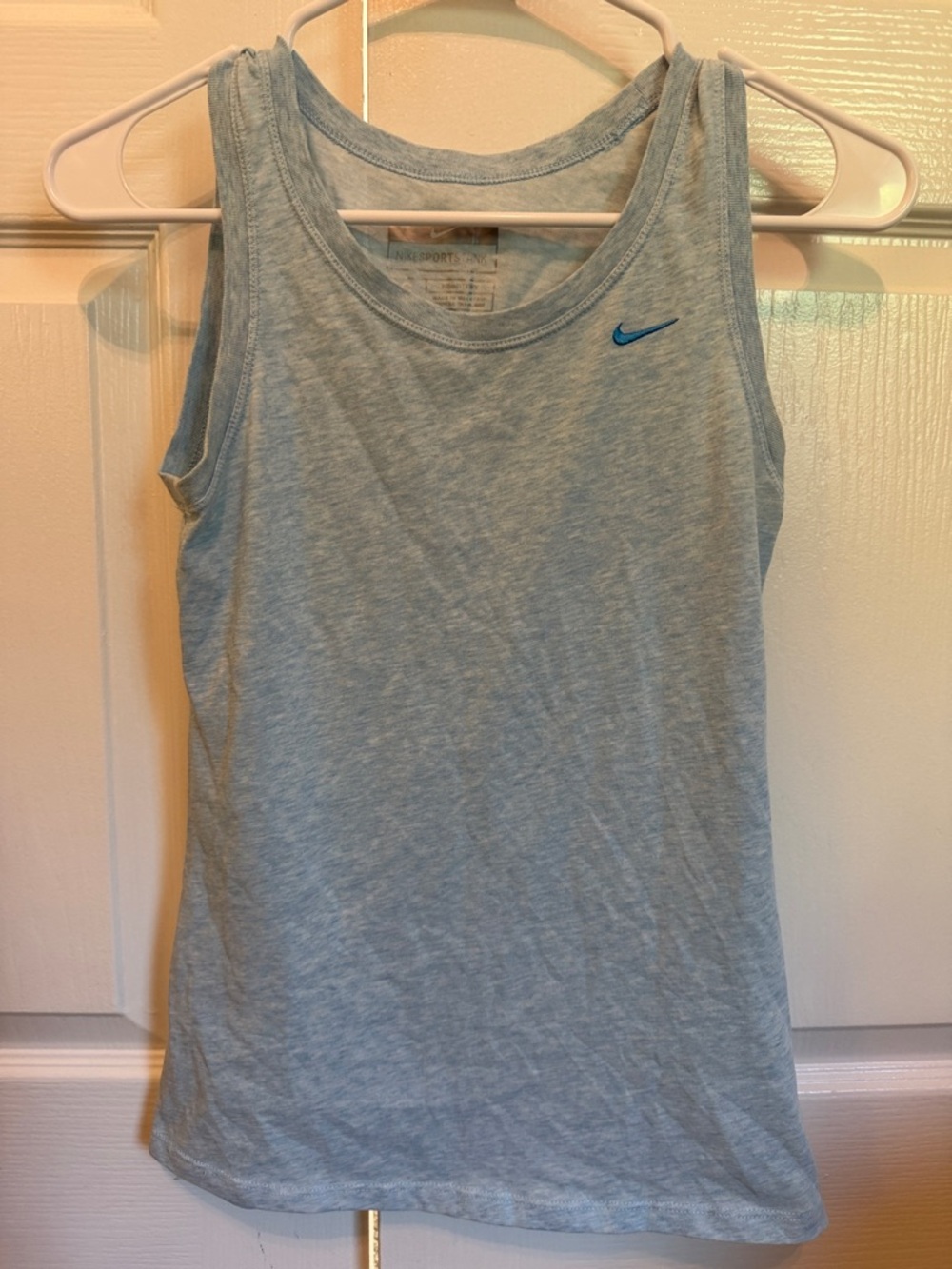 Nike Women’s Heather Light Blue Tank with Blue Swoosh size small
